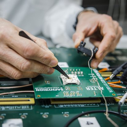 Technician Working in Electrical Measurements Laboratory